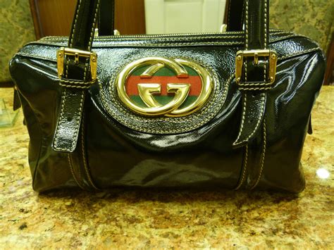 leather purse covered with discs 1990s gucci brand|original Gucci leather purse.